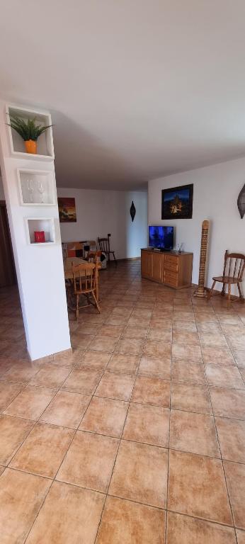 TV a/nebo společenská místnost v ubytování B&B La Mansarda