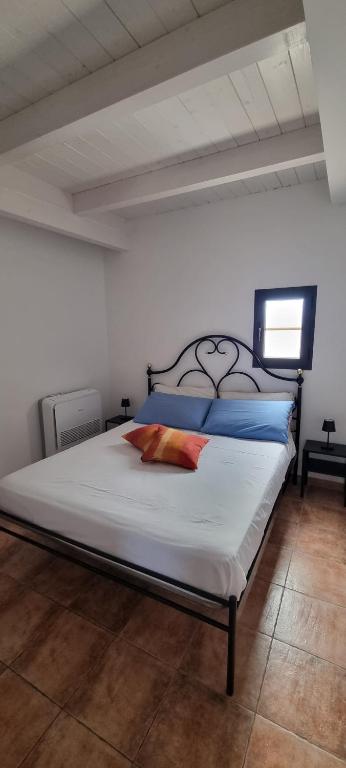 Postel nebo postele na pokoji v ubytování B&B La Mansarda