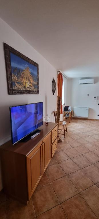 TV a/nebo společenská místnost v ubytování B&B La Mansarda