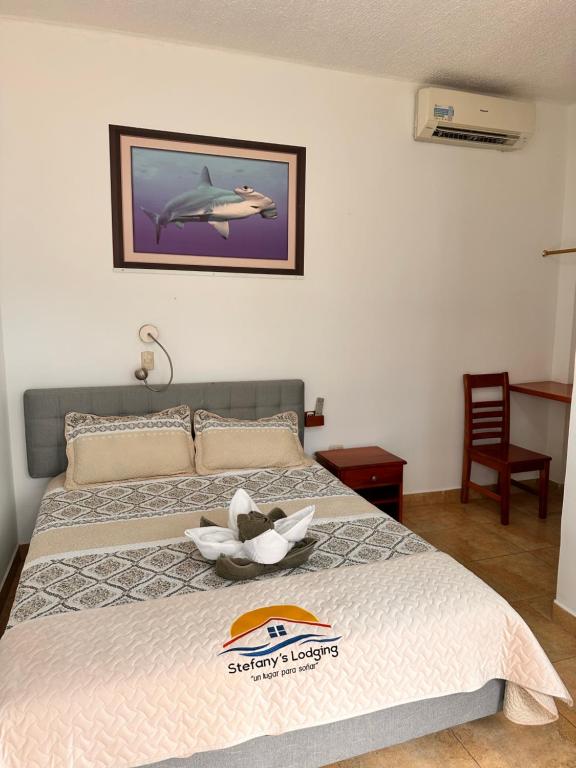 Postel nebo postele na pokoji v ubytování Stefany's Lodging