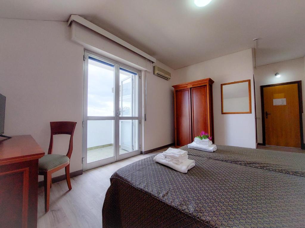 Postel nebo postele na pokoji v ubytování Lanka Hotel 2 stelle