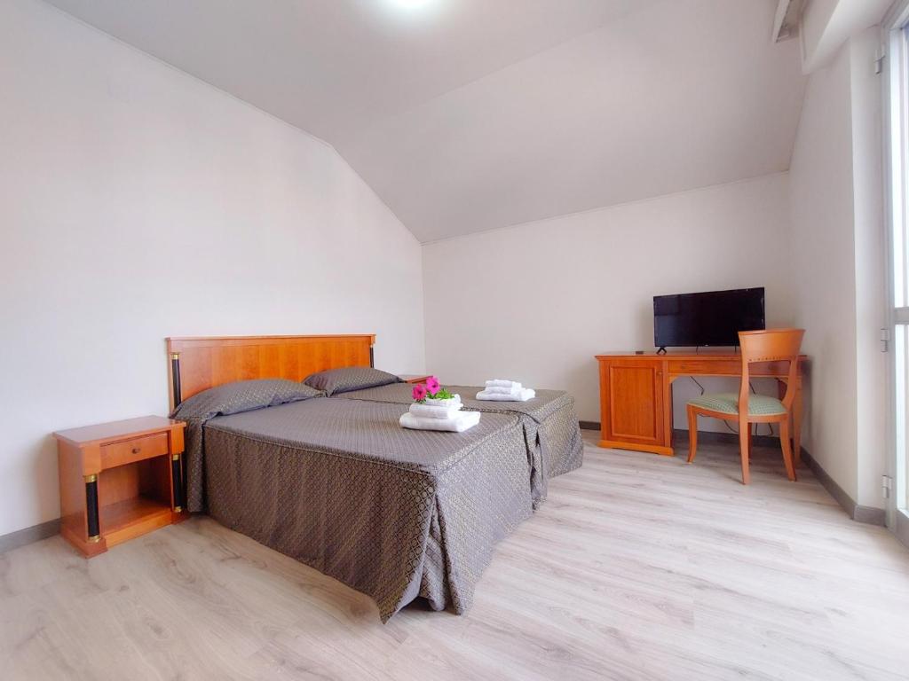 TV a/nebo společenská místnost v ubytování Lanka Hotel 2 stelle