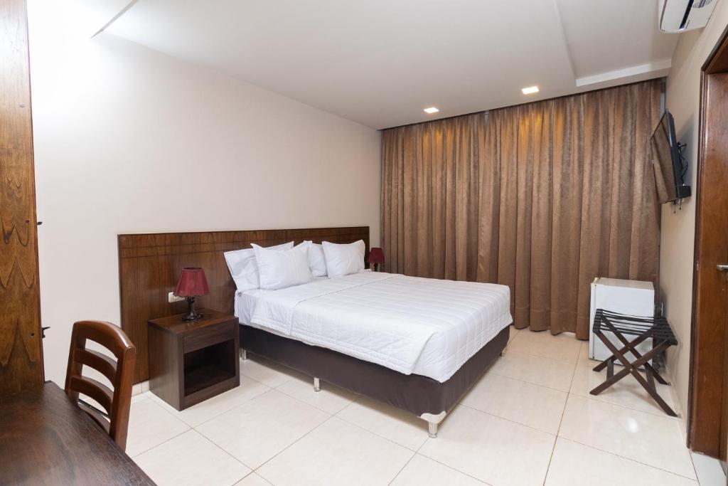Postel nebo postele na pokoji v ubytování Hotel Hohenau