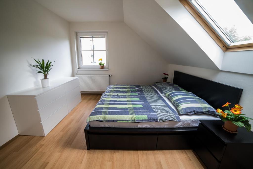 Postel nebo postele na pokoji v ubytování Apartmány Hasičárna