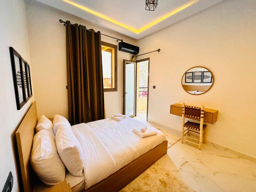 Postel nebo postele na pokoji v ubytování Salty Holiday Apartments