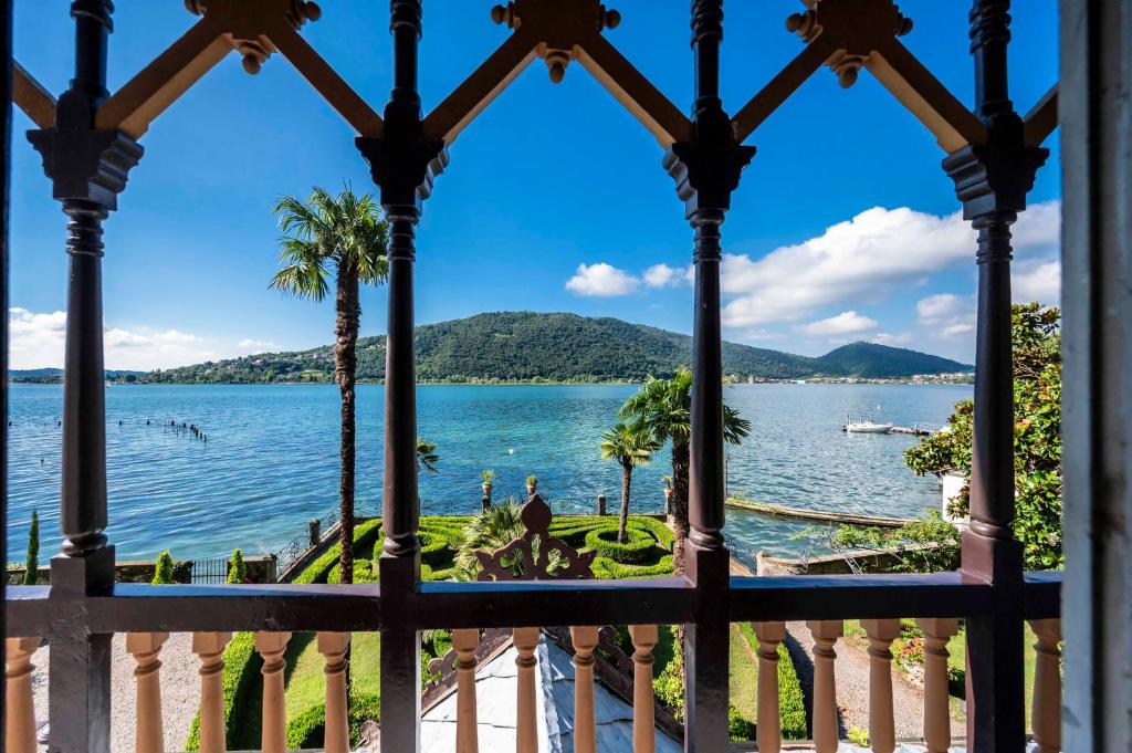 a view of a lake from a gazebo at Love Italy Homes - Villa Edith in Sarnico