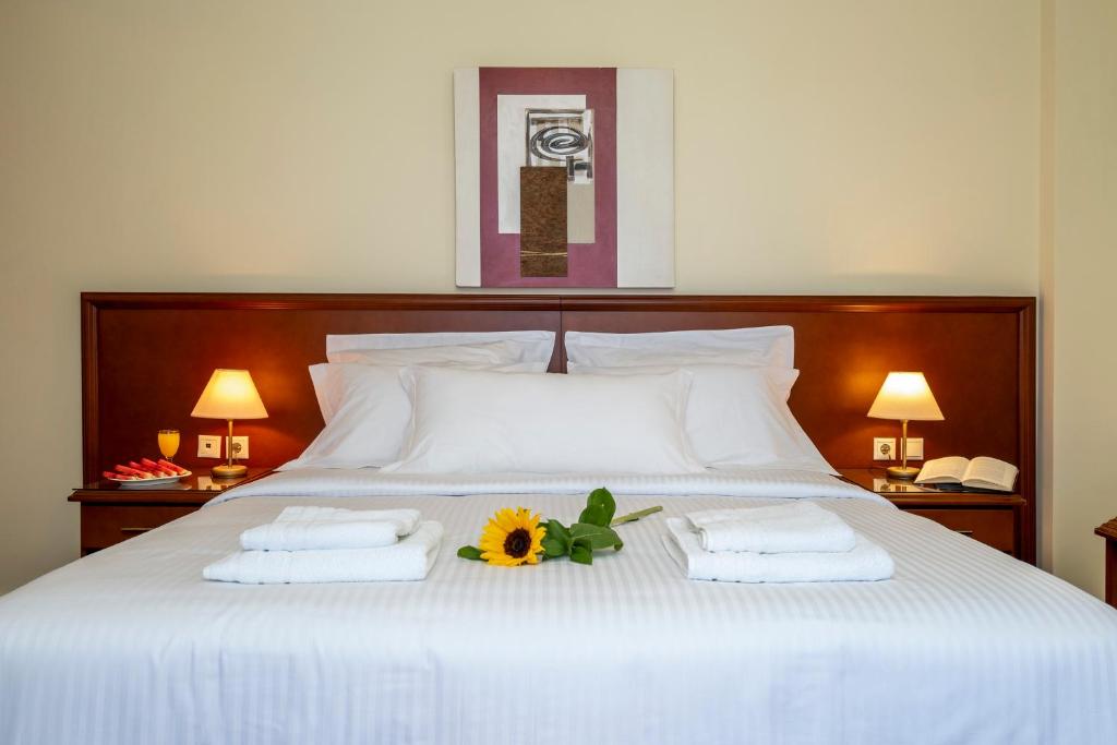 Postel nebo postele na pokoji v ubytování Porto Alegre Hotel