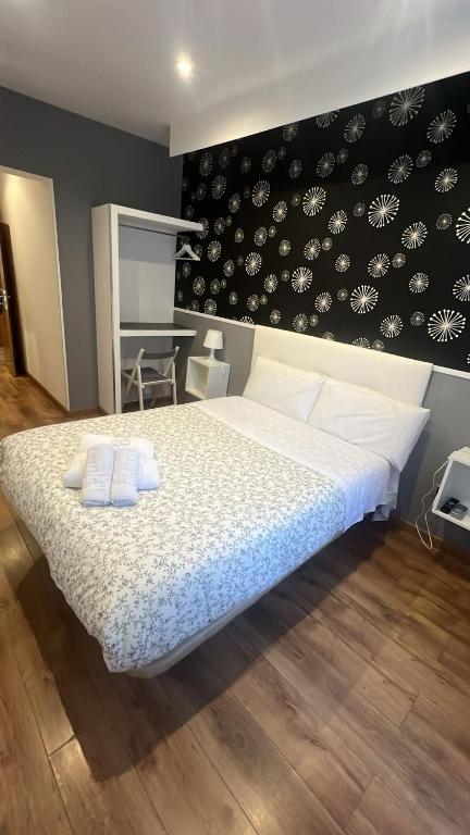Postel nebo postele na pokoji v ubytování Hostal New Dream Madrid