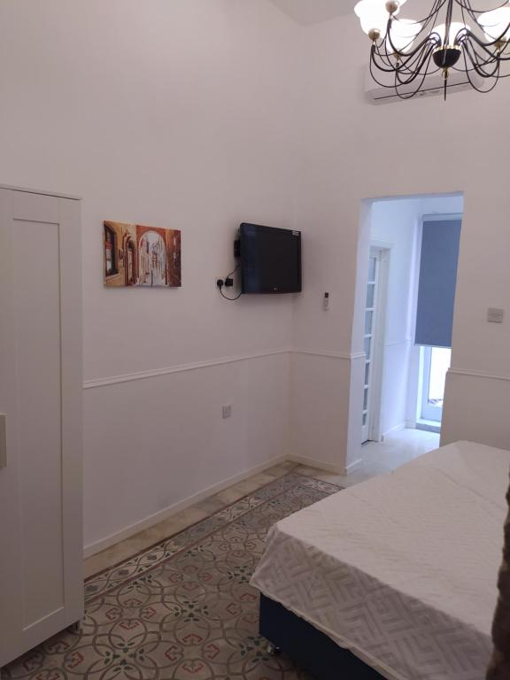 TV a/nebo společenská místnost v ubytování 3 Cities Heart 2