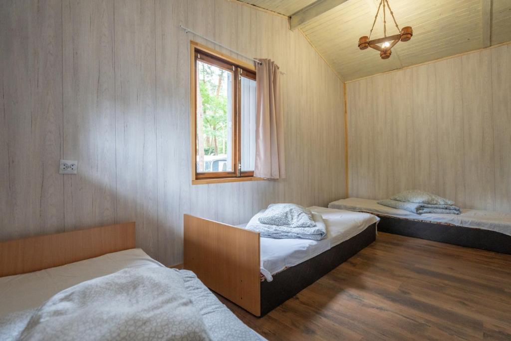 Postel nebo postele na pokoji v ubytování Ow Oliwia