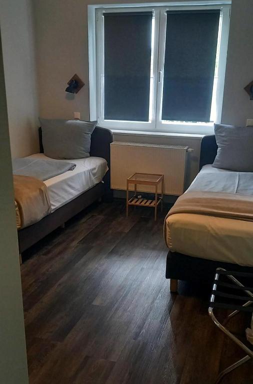 Postel nebo postele na pokoji v ubytování Lieth-Hotel-Grünreich