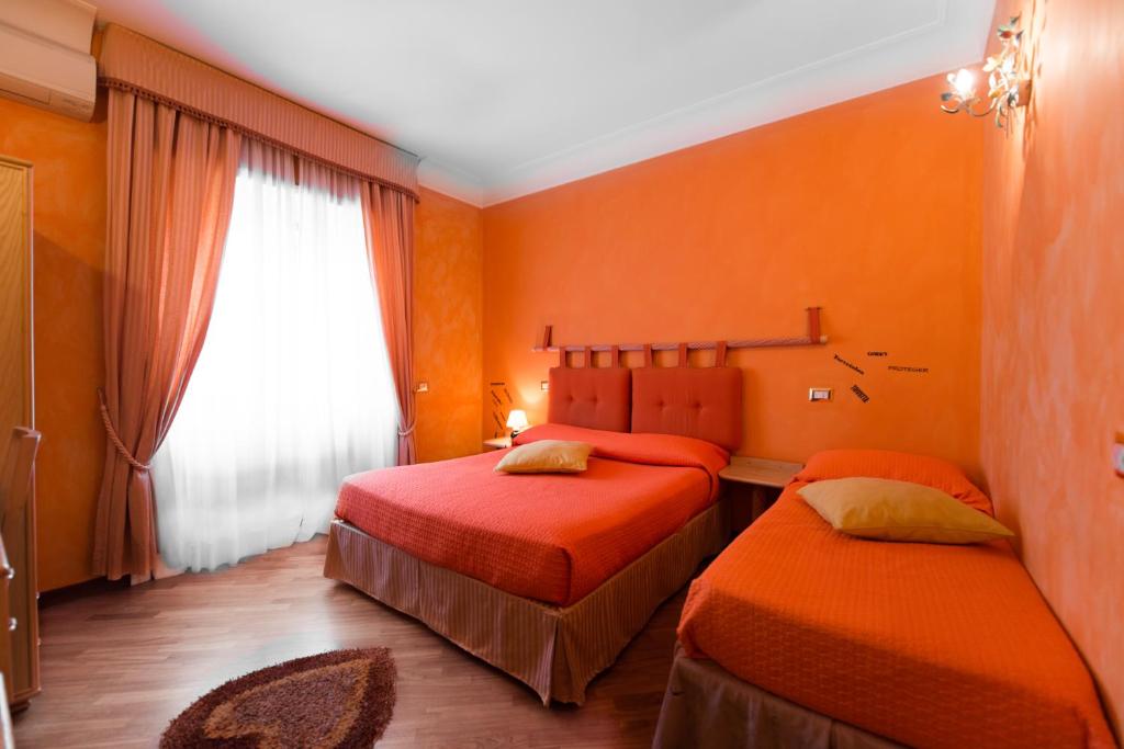 Posteľ alebo postele v izbe v ubytovaní Rifugio Di Roma