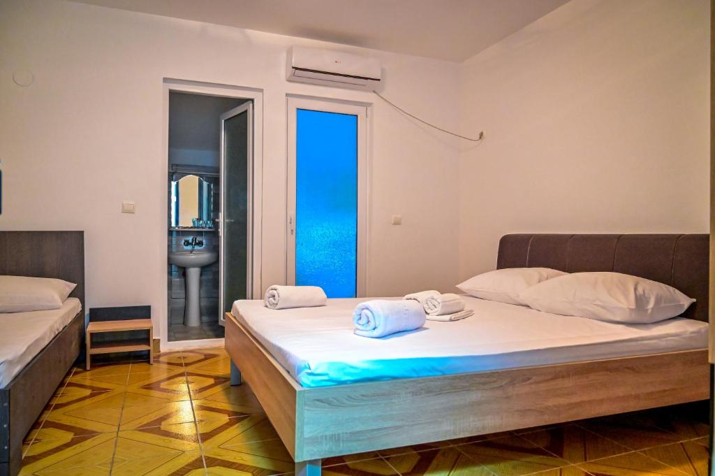 Postel nebo postele na pokoji v ubytování Hotel OBELISC