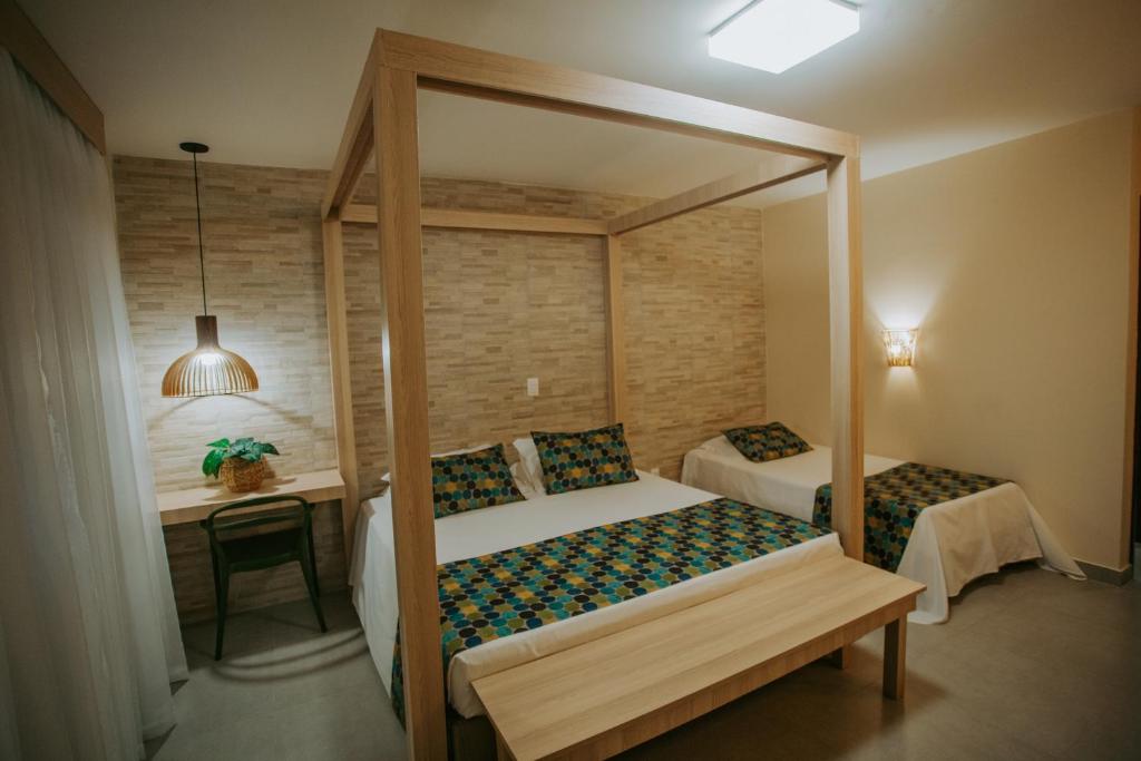 Postel nebo postele na pokoji v ubytování Pousada Tabapitanga