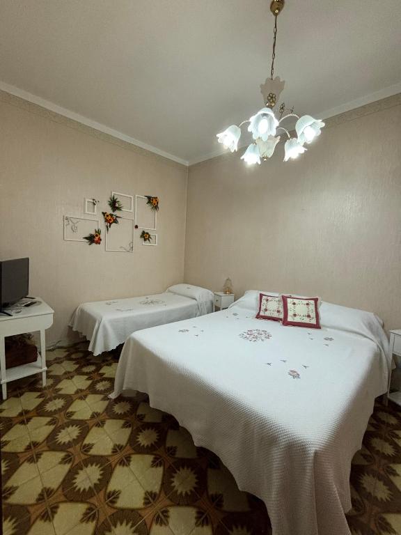 Postel nebo postele na pokoji v ubytování Casa Centamore