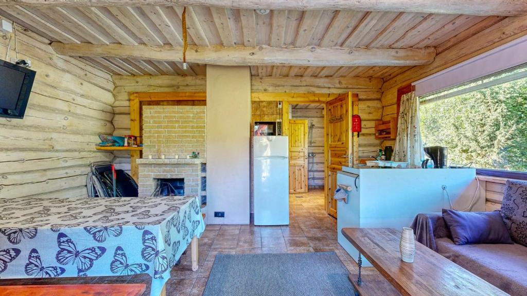 TV a/nebo společenská místnost v ubytování Holidayhouse with sauna and pond