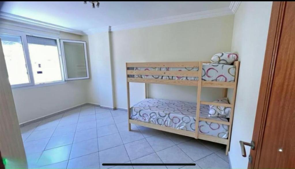 Postel nebo postele na pokoji v ubytování Belles Appartements à côté de la plage