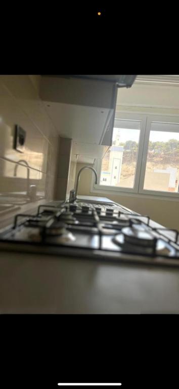 Kuchyň nebo kuchyňský kout v ubytování Belles Appartements à côté de la plage