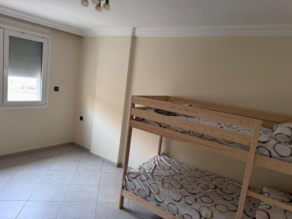 Postel nebo postele na pokoji v ubytování Belles Appartements à côté de la plage