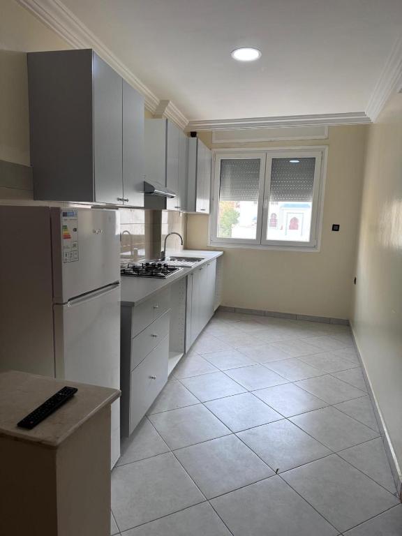 Kuchyň nebo kuchyňský kout v ubytování Belles Appartements à côté de la plage