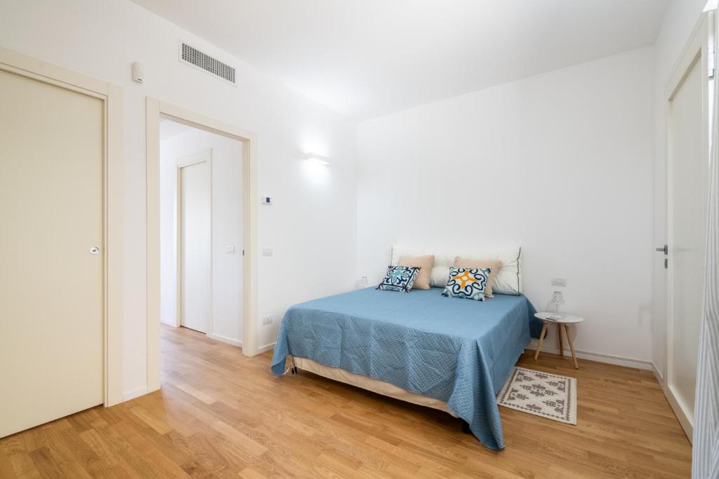 Кровать или кровати в номере Maison Aurora - loft Mare