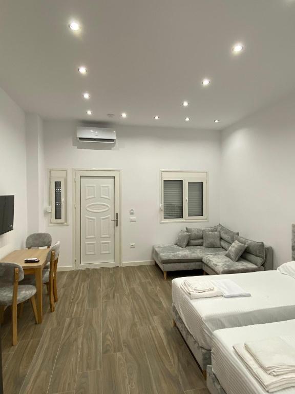 Postel nebo postele na pokoji v ubytování DEJA BLUE Cozy Apartments