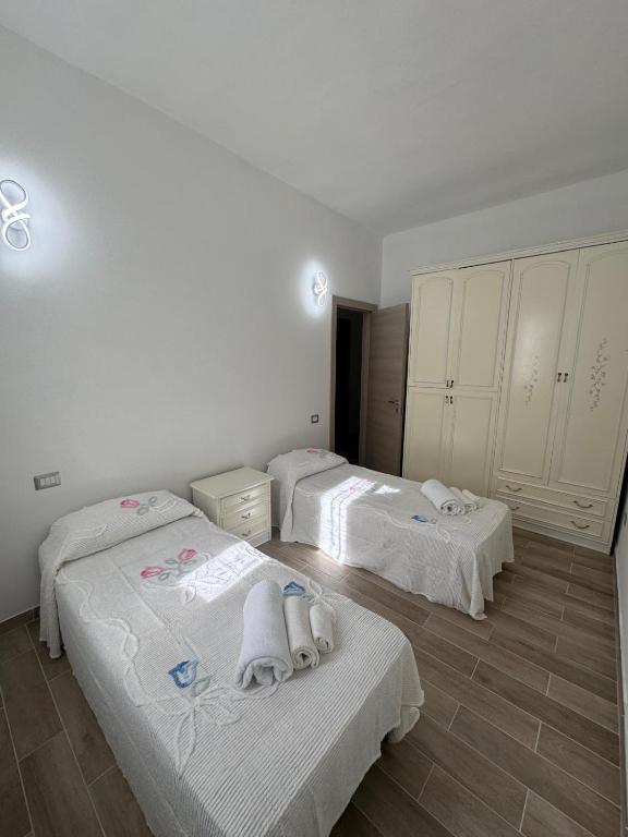 Postel nebo postele na pokoji v ubytování Il Pergolato