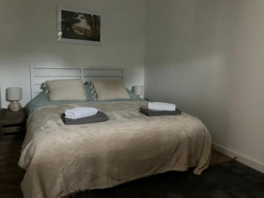 Postel nebo postele na pokoji v ubytování Ferme 1883 gîte