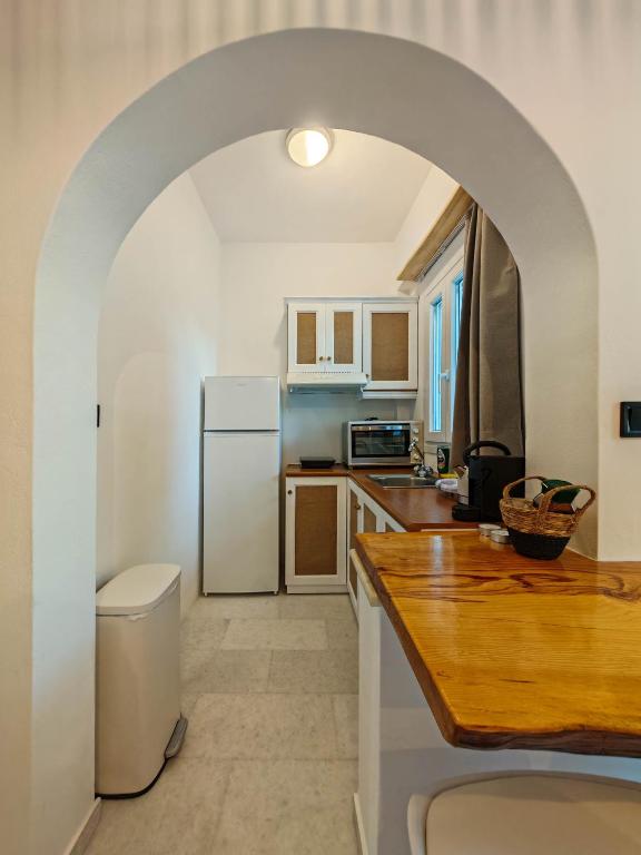 Kuchyň nebo kuchyňský kout v ubytování Paraga Suites