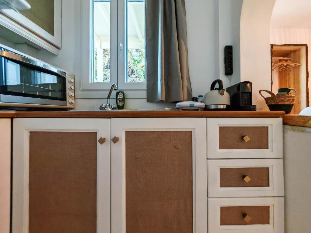 Kuchyň nebo kuchyňský kout v ubytování Paraga Suites