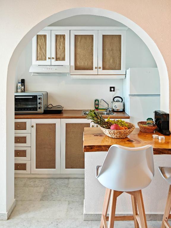 Kuchyň nebo kuchyňský kout v ubytování Paraga Suites