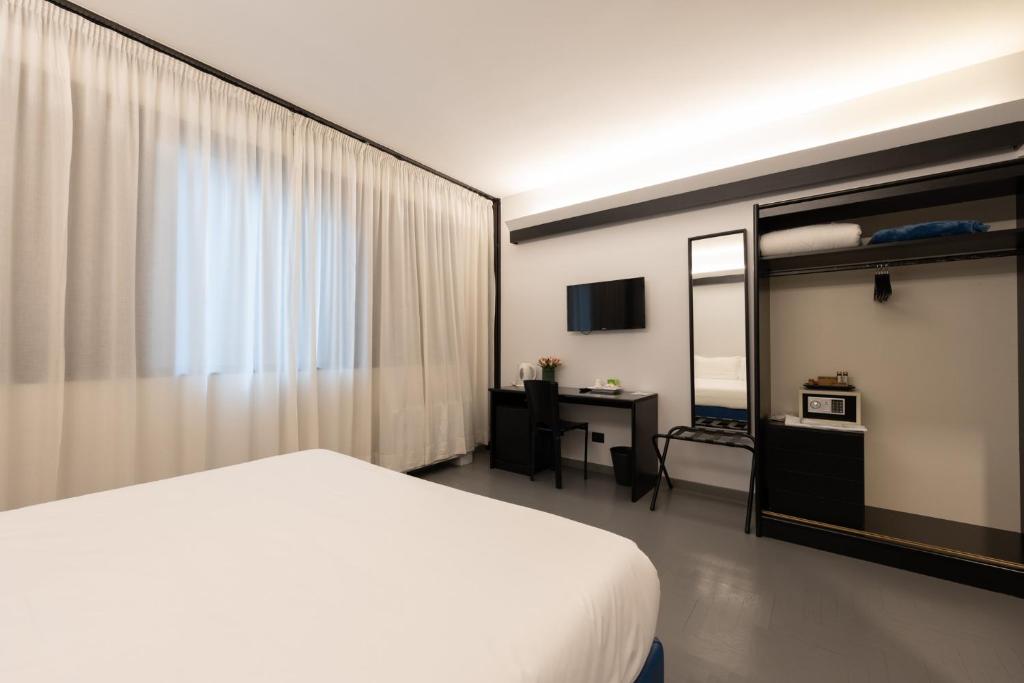 TV a/nebo společenská místnost v ubytování Cristal Palace Hotel