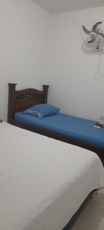 Letto o letti in una camera di HOSTAL CARACOLI - HUECO