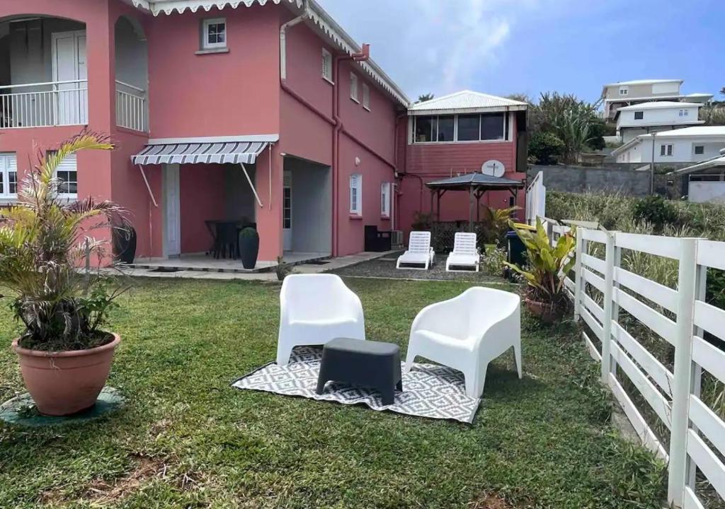 Zahrada ubytování Les Tourterelles - Appartement vue mer & jacuzzi