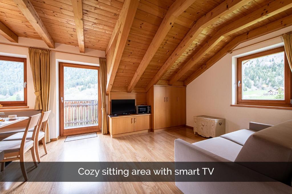 TV a/nebo společenská místnost v ubytování Apartments Nature Apis Landheim