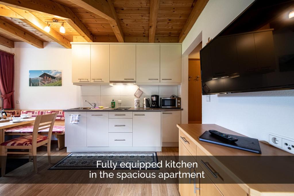 Kuchyň nebo kuchyňský kout v ubytování Apartments Nature Apis Landheim