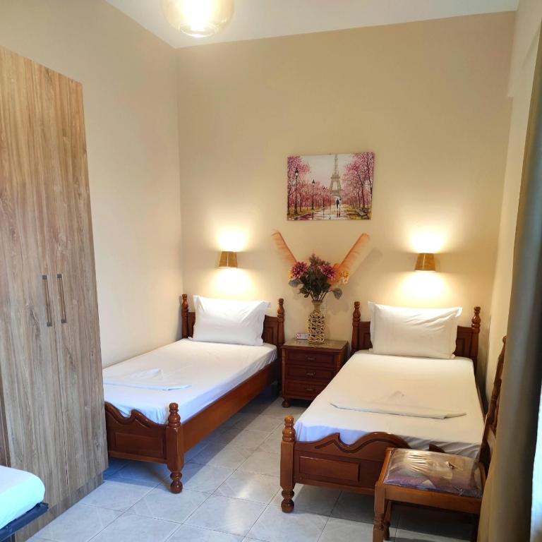 Postel nebo postele na pokoji v ubytování Borianoula Apartments