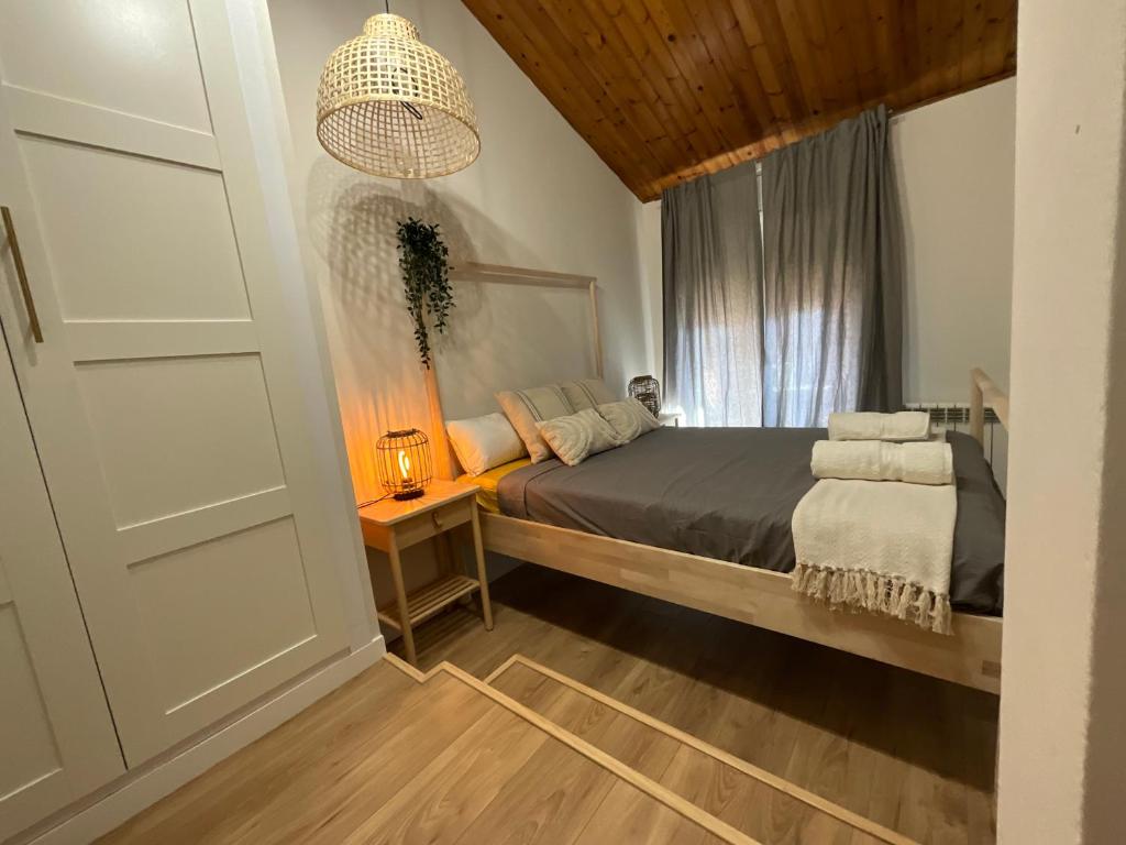 Postel nebo postele na pokoji v ubytování Escapada