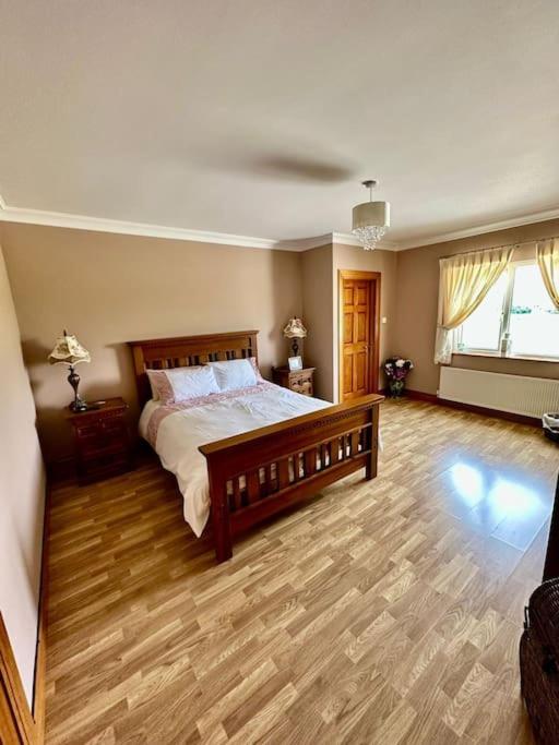 Postel nebo postele na pokoji v ubytování Ballnamona house