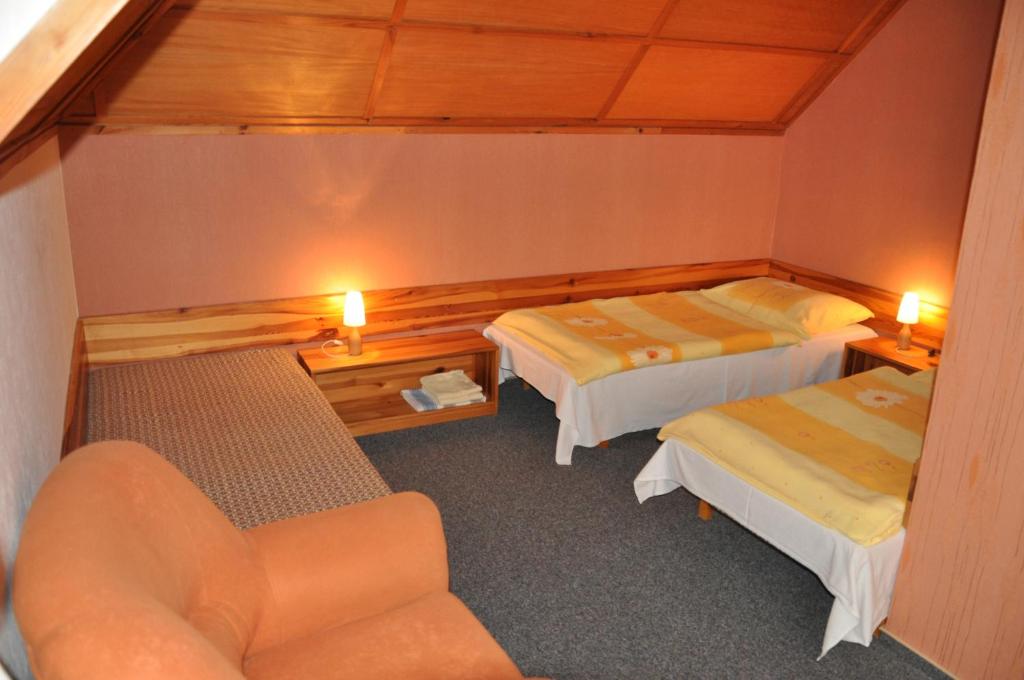 Postel nebo postele na pokoji v ubytování Pension Nostalgie