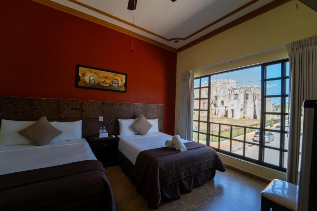 Postel nebo postele na pokoji v ubytování Hotel Rinconada del Convento