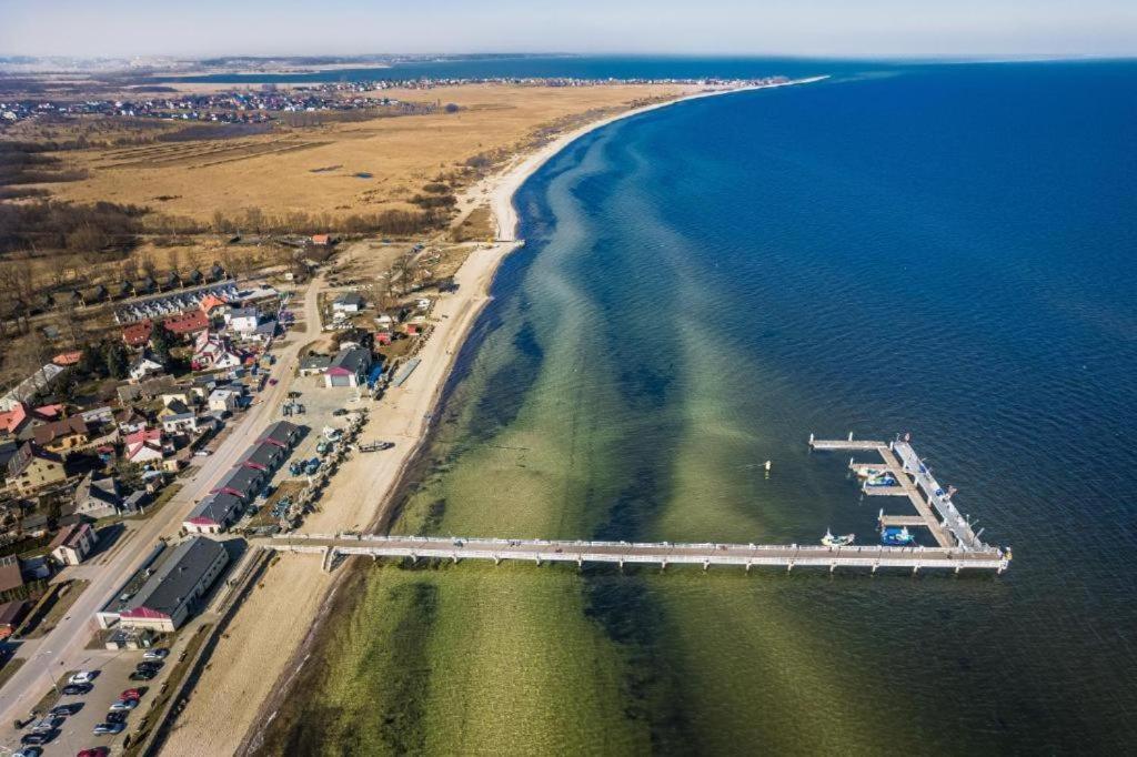 an aerial view of a beach and the ocean at Angel Sea Hill Apartment in Mechelinki