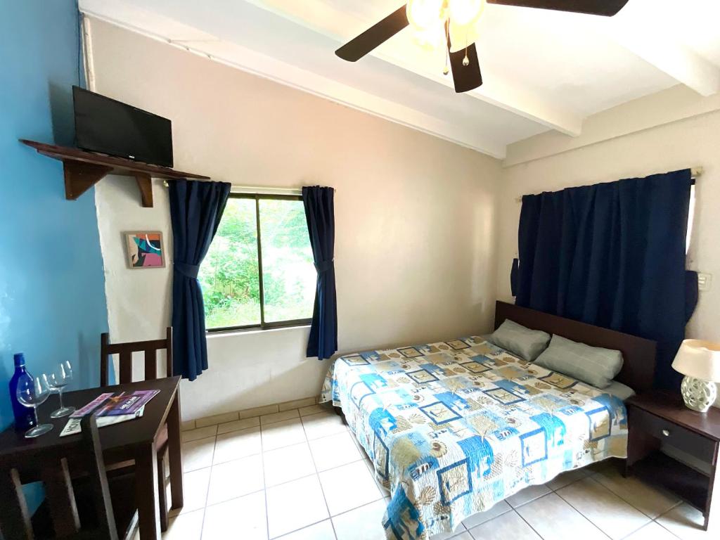 Postel nebo postele na pokoji v ubytování Casitas de la Paz