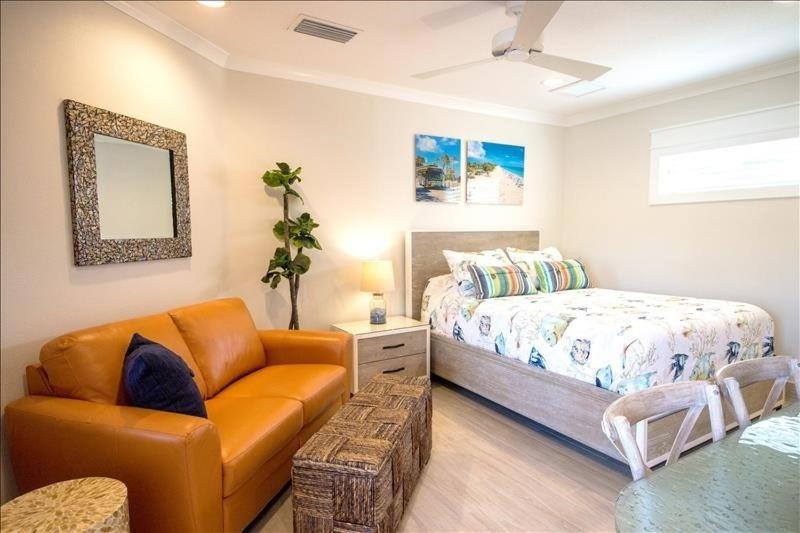 Giường trong phòng chung tại The Rod and Reel Resort Suite 5