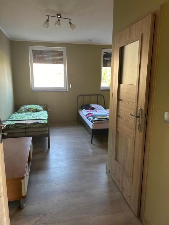 Postel nebo postele na pokoji v ubytování Ararauna