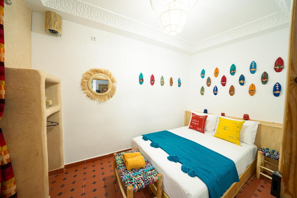 Ein Bett oder Betten in einem Zimmer der Unterkunft Dar Sekka