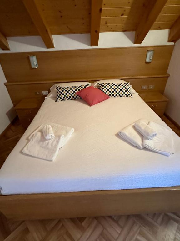 Postel nebo postele na pokoji v ubytování Hotel Belfort