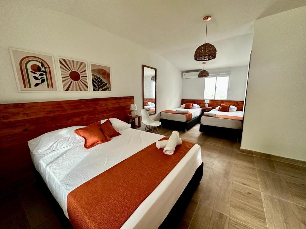 Cama ou camas em um quarto em Eco-Hotel Palma É Coco