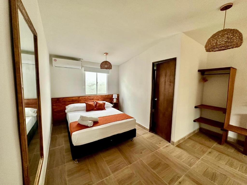 Cama ou camas em um quarto em Eco-Hotel Palma É Coco