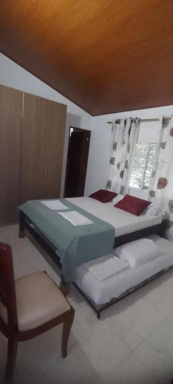 Postel nebo postele na pokoji v ubytování Villa Las Colonias